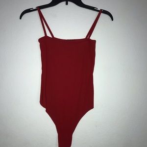 High cut body suit